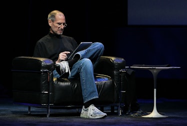 SAN FRANCISCO - JANUARY 27: Apple Inc. CEO Steve Jobs demonstrates the new iPad as he speaks during...