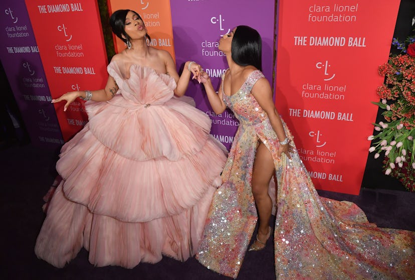 US rapper Cardi B (L) and her sister Hennessy Carolina (R) arrive for Rihanna's 5th Annual Diamond B...