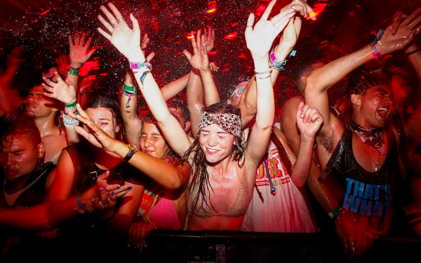 INDIO, CA.-- APRIL 19, 2014-- An overflowing crowd inside the Sahara Tent celebrates the DJ known as...