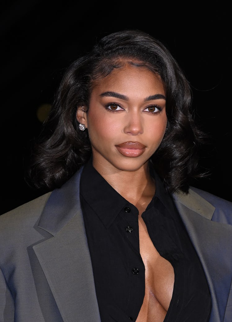 LONDON, ENGLAND - FEBRUARY 19: Lori Harvey attends the Burberry show during London Fashion Week Febr...