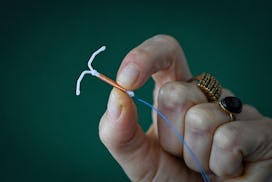 This photograph taken on March 30, 2023, shows a copper IUD (intrauterine device) in Toulouse, south...