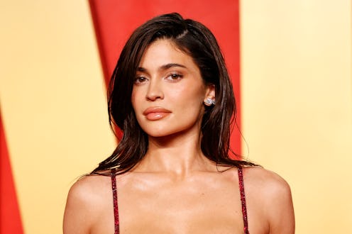 Kylie Jenner wore a red latex dress to a Las Vegas summer kickoff event.