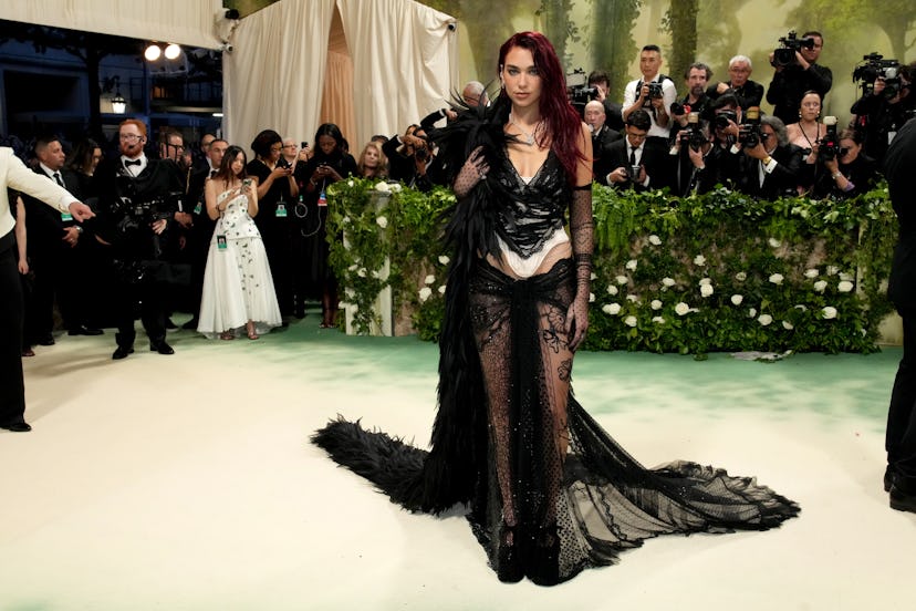 NEW YORK, NEW YORK - MAY 06: Dua Lipa attends the 2024 Met Gala Celebrating “Sleeping Beauties: Reaw…