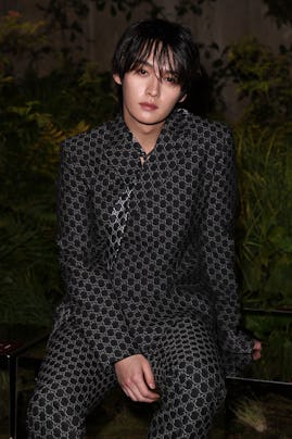 Lee Know attends the Gucci Cruise 2025 Fashion Show at Tate Modern on May 13, 2024 in London, Englan...