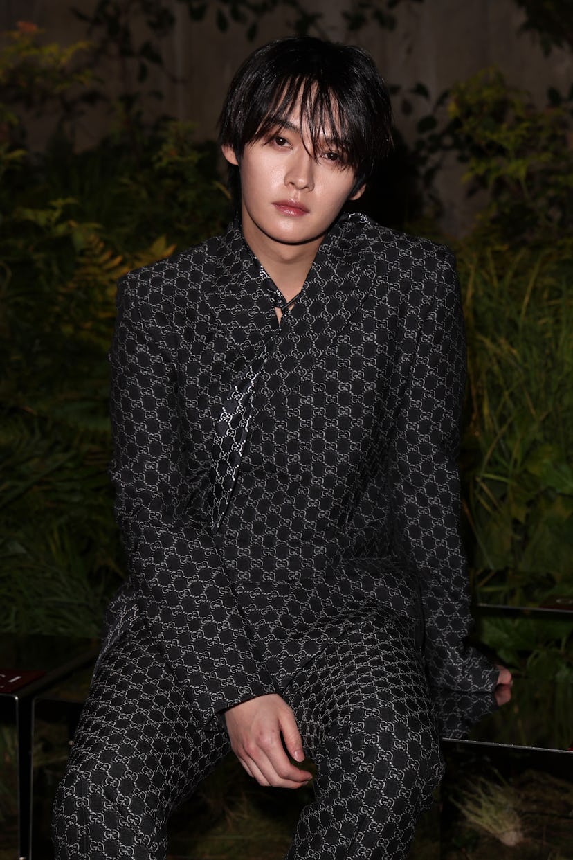 Lee Know attends the Gucci Cruise 2025 Fashion Show at Tate Modern on May 13, 2024 in London, Englan...