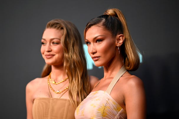 US models Gigi Hadid (L) and Bella Hadid arrive for the 2019 MTV Video Music Awards at the Prudentia...