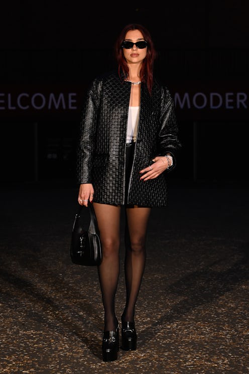 LONDON, ENGLAND - MAY 13: Dua Lipa arrives at the Gucci Cruise 2025 Fashion Show at Tate Modern on M...