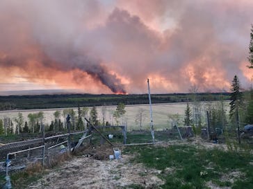 FORT NELSON, BRITISH COLUMBIA, CANADA - MAY 14: Smoke rises after fire erupts in Western Canada on M...