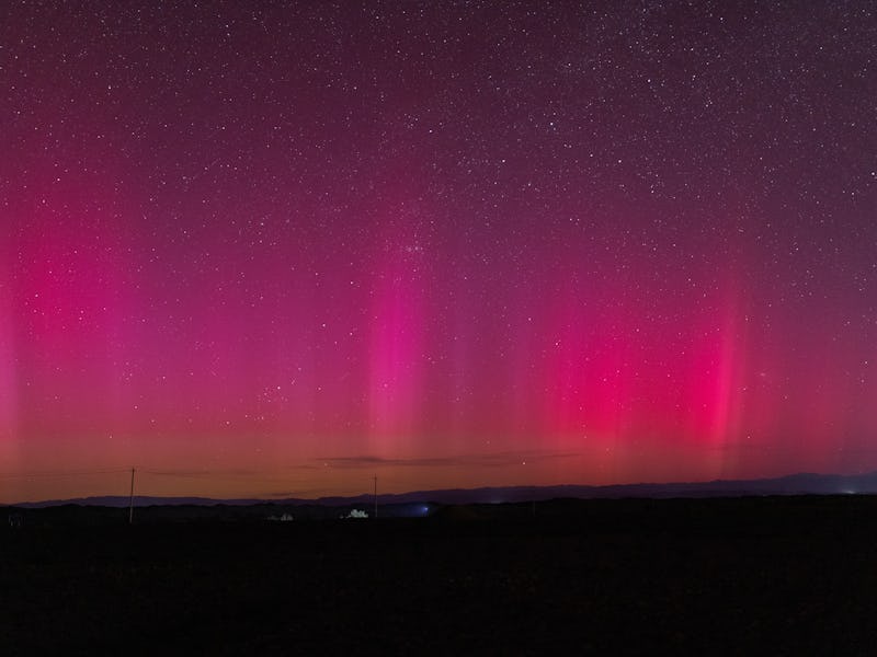 ALTAY, CHINA - MAY 14: The aurora borealis glows in the night sky due to the current geomagnetic sto...