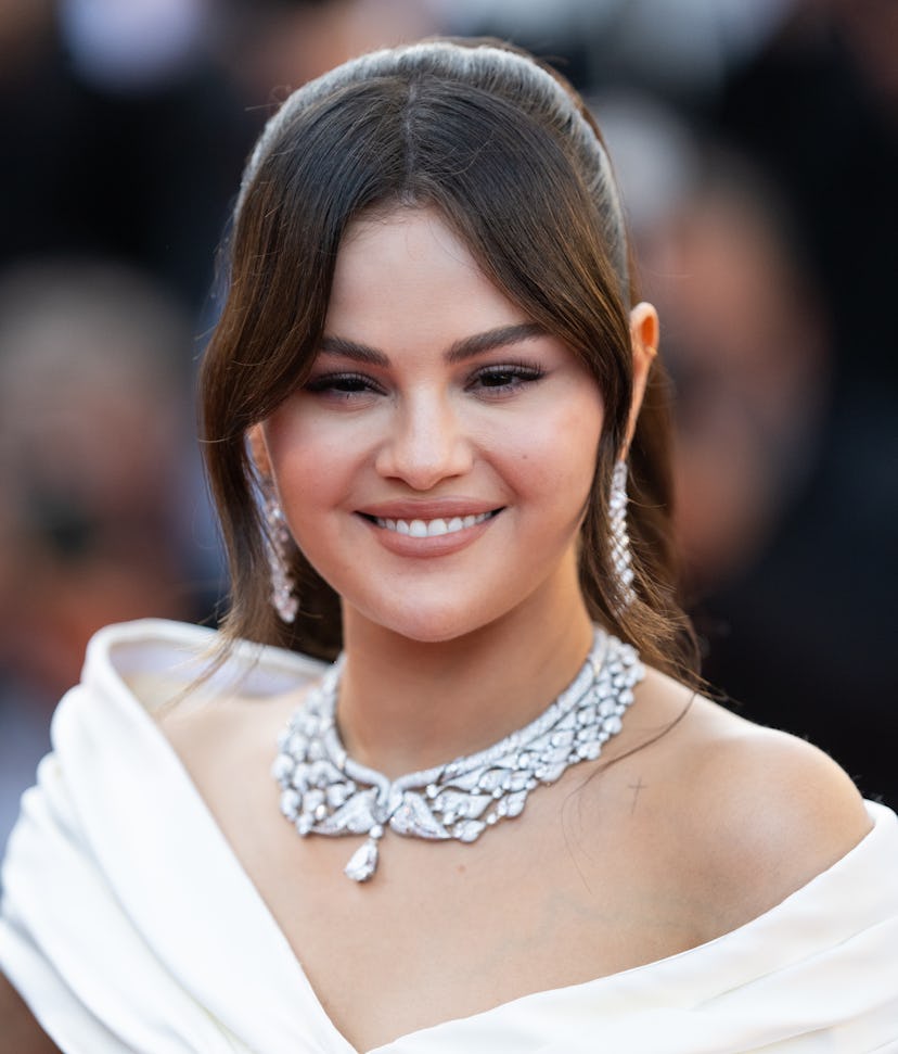 Selena Gomez attends the "Emilia Perez" Red Carpet at the 77th annual Cannes Film Festival in a velv...