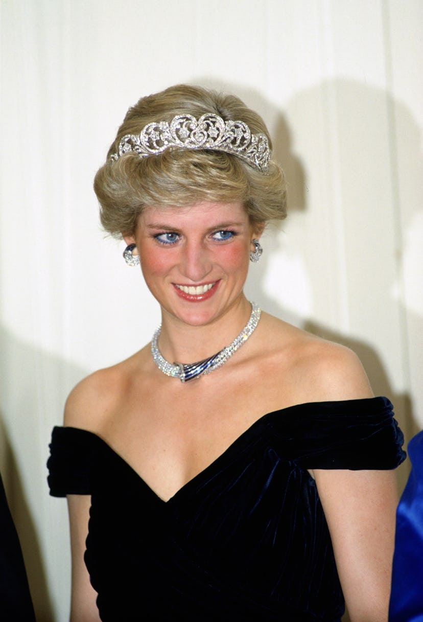 Diana, Princess of Wales wears a sapphire and diamond necklace, which was a gift from the Sultan of ...