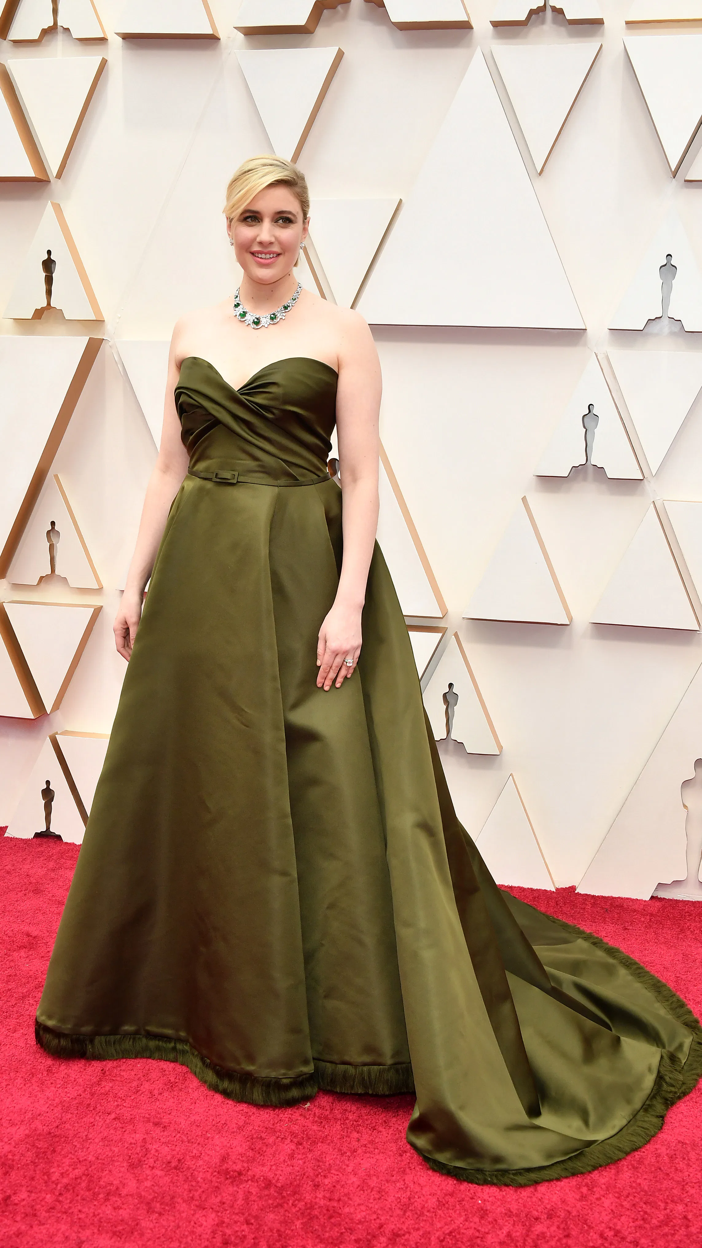 greta gerwig prom dress Greta Gerwig wears a prom dress to direct the prom scene in her feature  film, 'Lady Bird' (2017) Swipe to see her directing Margot Robbie in a pink  jumpsuit on the set