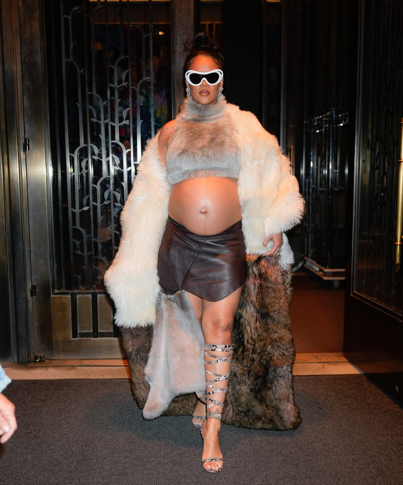 Rihanna stepped out in New York City wearing a fur outfit with lace-up sandals and a massive 9-carat…