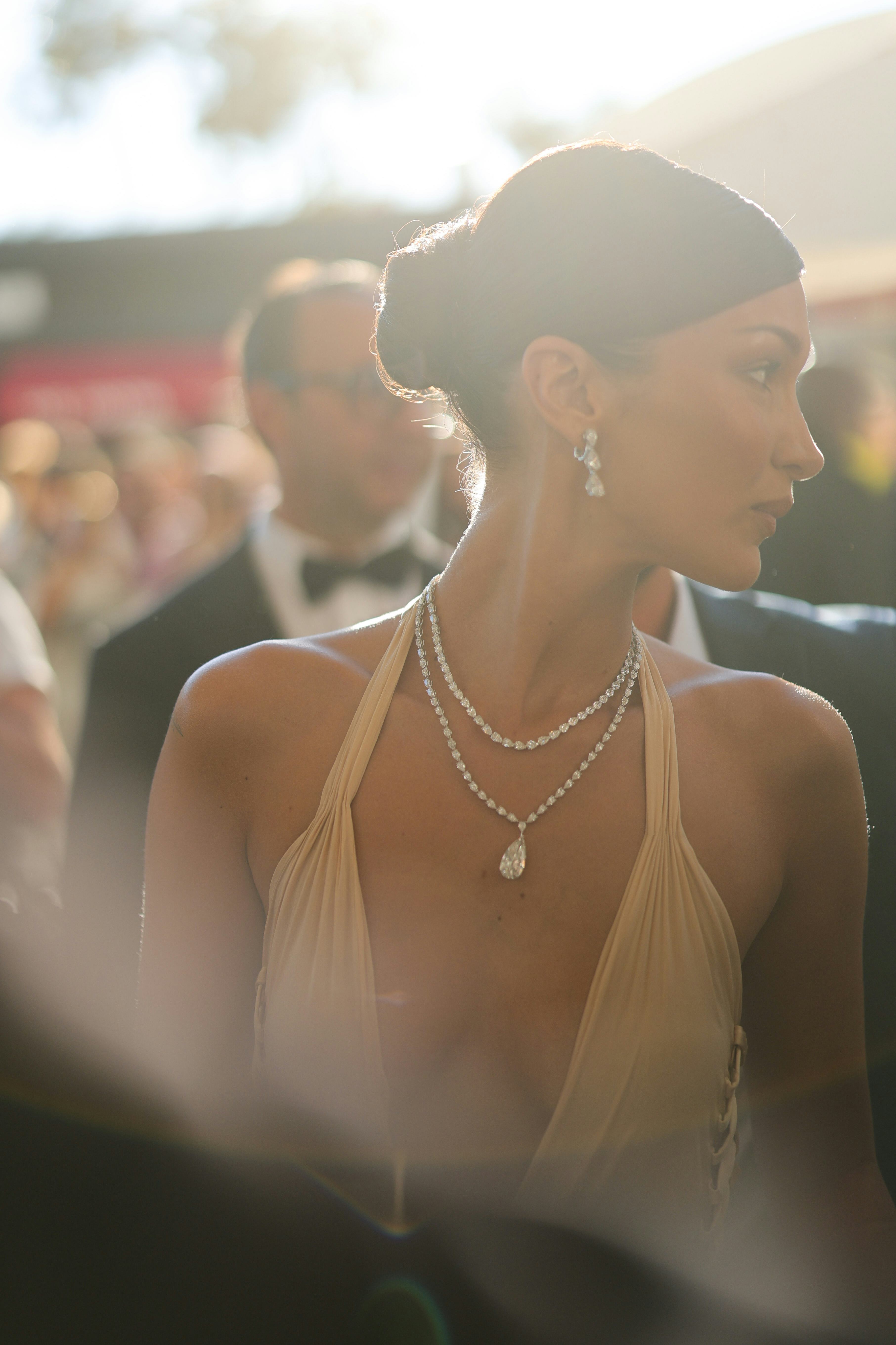 Bella Hadid is seen at the Hôtel Martinez during the 77th Cannes Film Festival wearing a lattice-det&hellip;