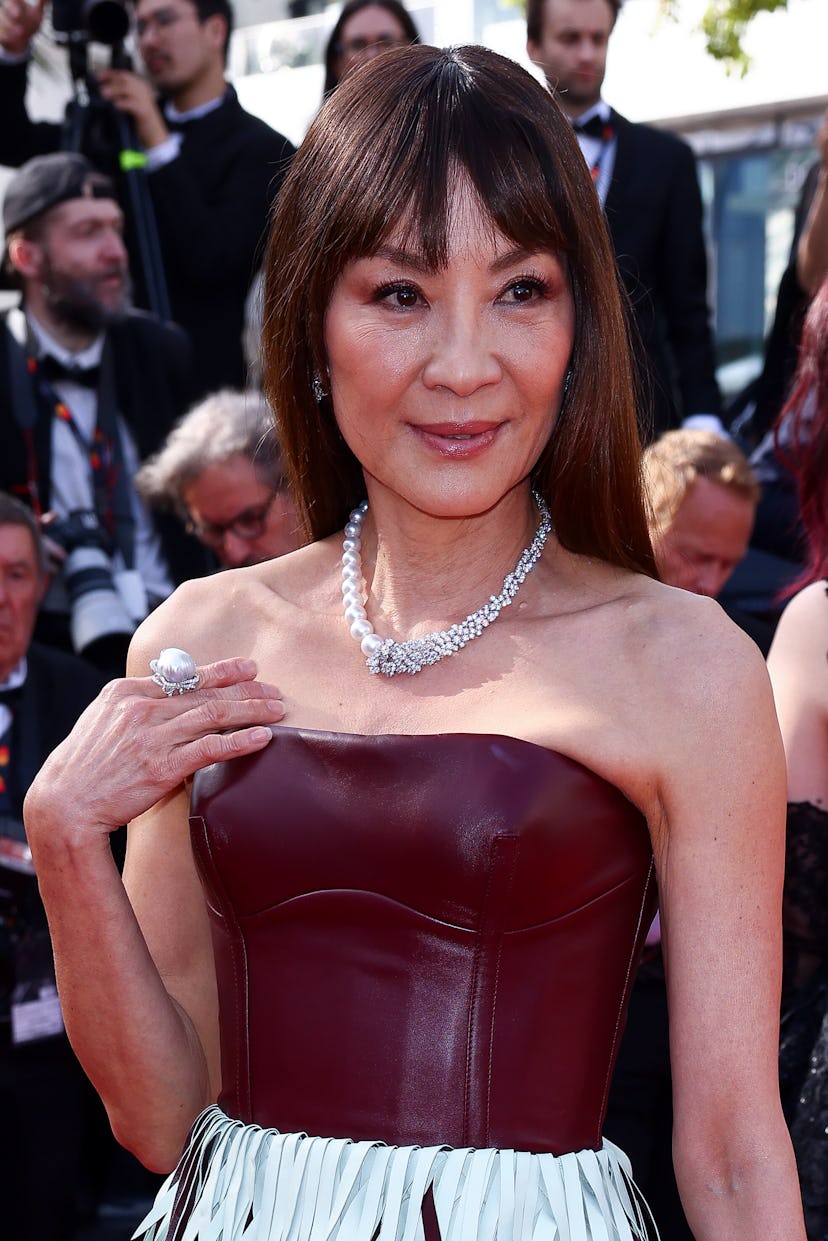 CANNES, FRANCE - MAY 19: Michelle Yeoh attends the "Horizon: An American Saga" Red Carpet at the 77t...