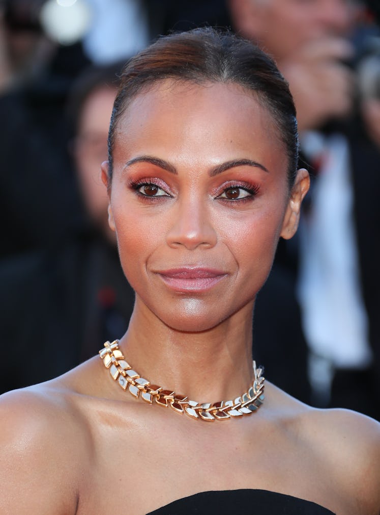 CANNES, FRANCE - MAY 18: Zoe Saldana attends the "Emilia Perez" Red Carpet at the 77th annual Cannes...