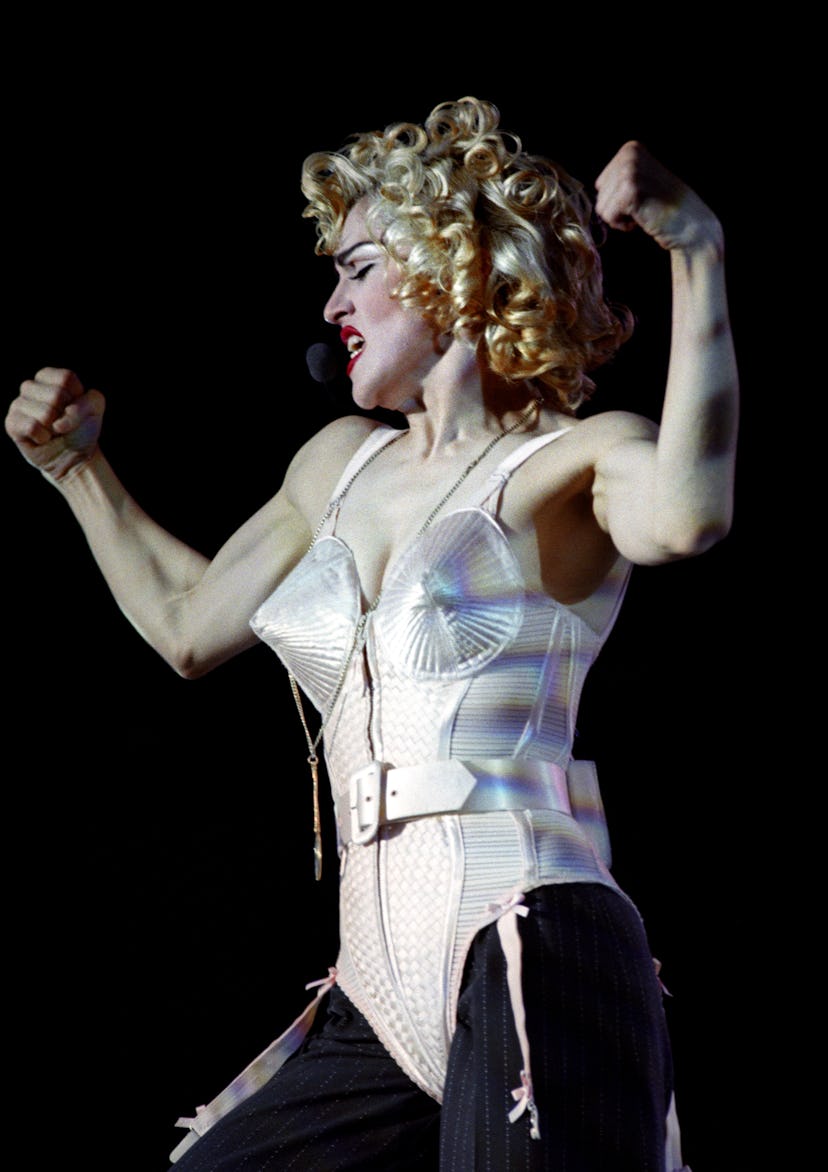This is an undated PA photo of Madonna in iconic cone bra look in 1990. 