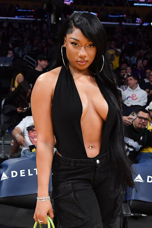 LOS ANGELES, CALIFORNIA - APRIL 07: Megan Thee Stallion attends a basketball game between the Los An...