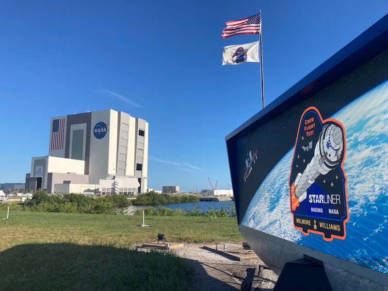 The countdown clock at Kennedy Space Center's press site sports the Boeing CST-100 Starliner logo fo...