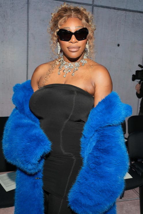 Serena Williams black strapless dress and blue coat