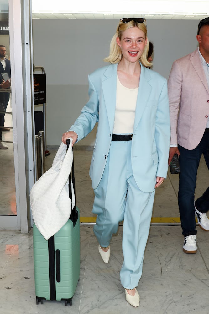 Elle Fanning is seen at Nice Airport during the 77th Cannes Film Festival 