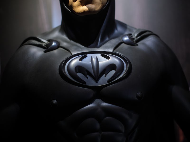 LONDON, ENGLAND - FEBRUARY 22: A Batman costume from the 1997 Batman & Robin film worn by George Clo...