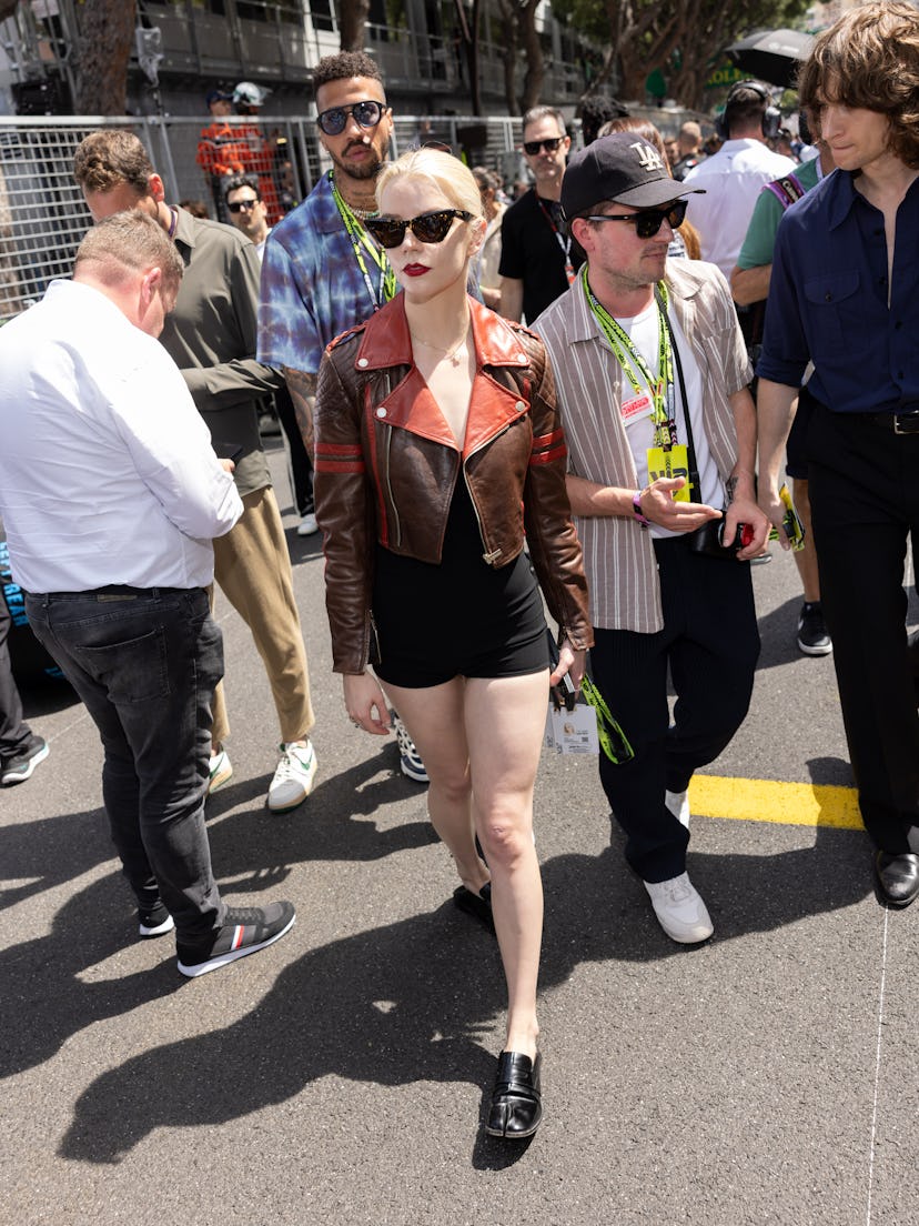 Anya Taylor-Joy wears a brown moto jacket and bodysuit to attend the F1 Grand Prix of Monaco at Circ…
