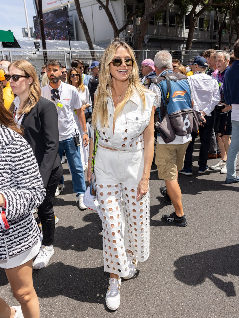 Heidi Klum’s white denim cutout set at the F1 Grand Prix of Monaco.