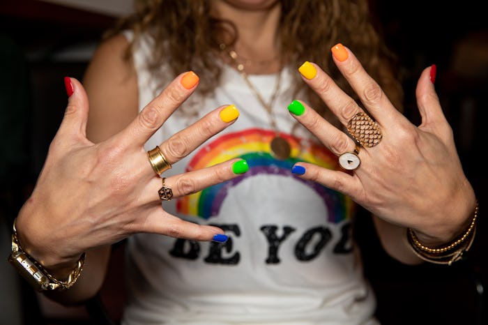 WASHINGTON, D.C. - JUNE 4: A woman shows off her pride-themed nails at As You Are, the newest gay ...