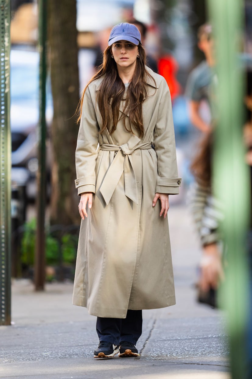 Dakota Johnson off-duty trench coat sneakers outfit