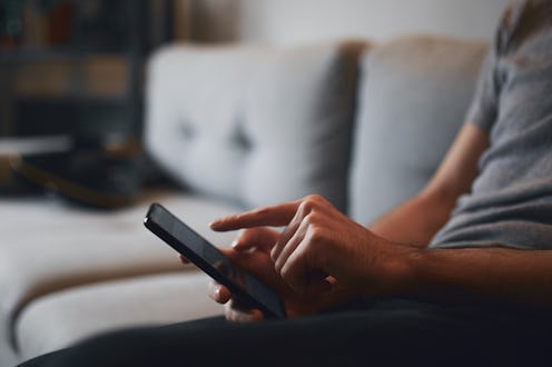 Man uses a smartphone