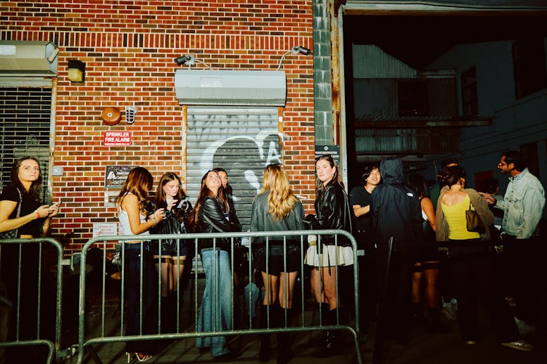 Club goers wait in line outside of Elsewhere nightclub in the Bushwick neighborhood of Brooklyn, New...