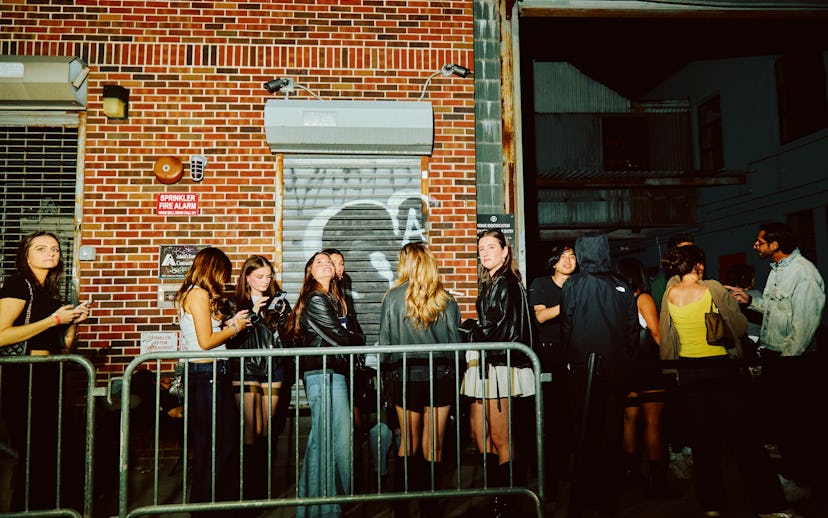 Club goers wait in line outside of Elsewhere nightclub in the Bushwick neighborhood of Brooklyn, New...