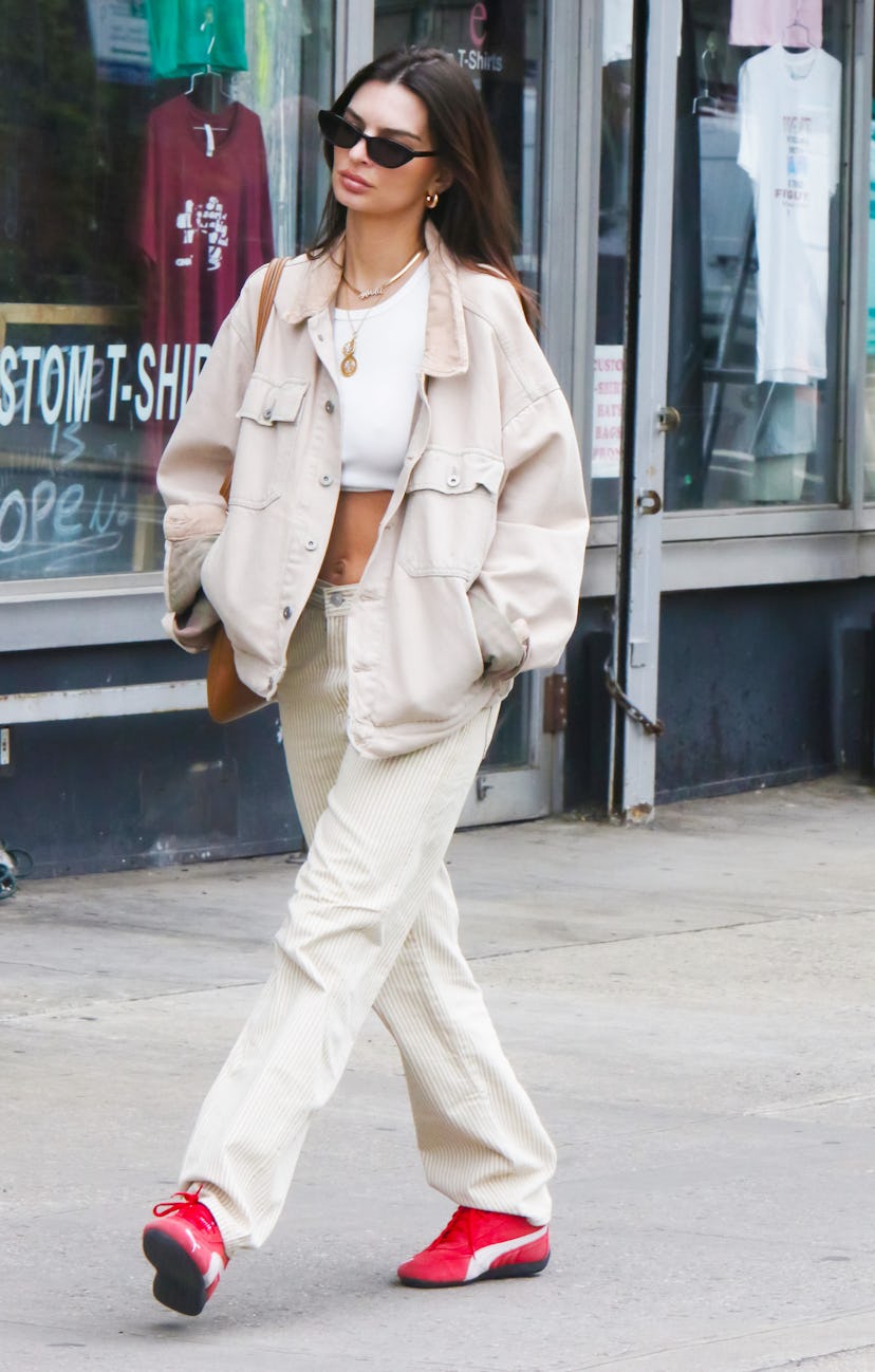 Emily Ratajkowski wears a beige shacket in New York City.