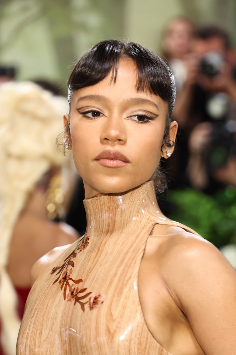 NEW YORK, NEW YORK - MAY 06: Taylor Russell attends The 2024 Met Gala Celebrating "Sleeping Beauties...