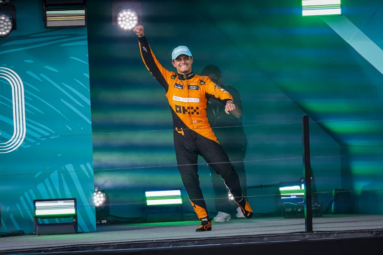 MIAMI, FLORIDA - MAY 5: McLaren driver Lando Norris of Britain arrives on the podium after winning t...