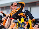 MIAMI, FLORIDA - MAY 5:  Lando Norris of Great Britain and McLaren celebrates with the team in parc ...