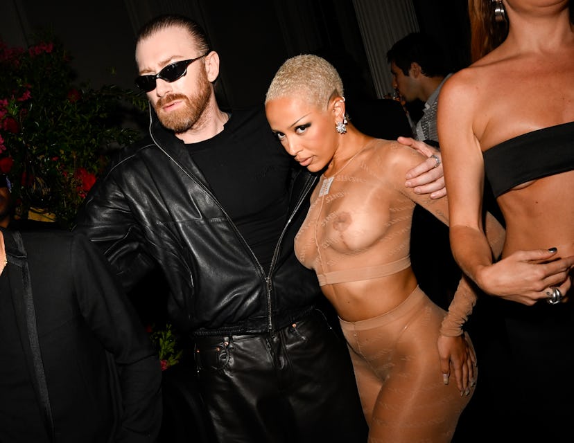 Doja Cat at the 2024 met gala after-party in a naked outfit and tights