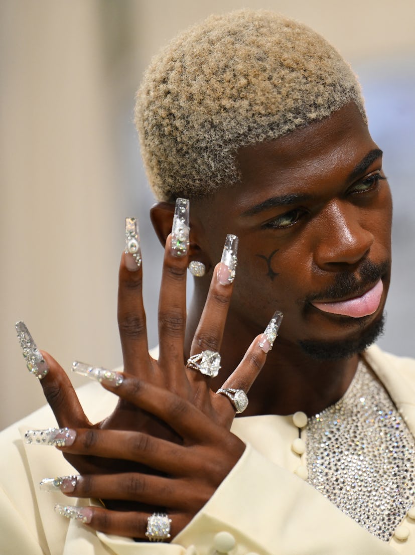 Lil Nas X wore XXL crystal nails to the 2024 Met Gala.