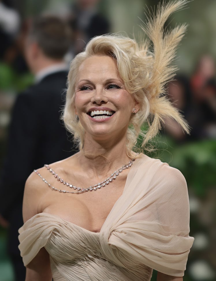 NEW YORK, NEW YORK - MAY 06: Pamela Anderson attends The 2024 Met Gala Celebrating "Sleeping Beautie...