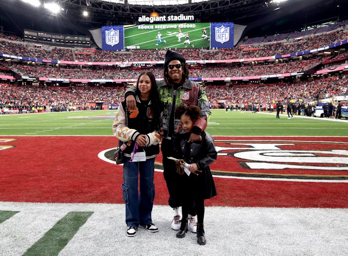 LAS VEGAS, NEVADA - FEBRUARY 11: (L-R) Blue Ivy Carter, Jay-Z and Rumi Carter attend the Super Bowl ...