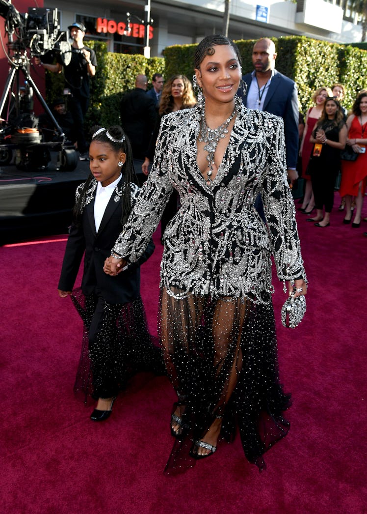 Blue Ivy Carter and Beyoncé attends the premiere of Disney's "The Lion King" at Dolby Theatre on Jul...