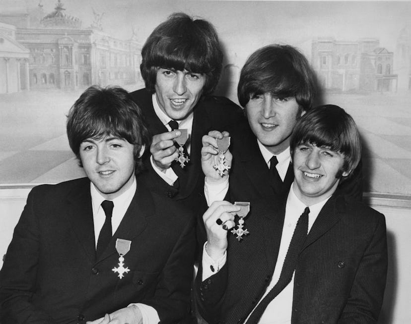 British rock group the Beatles hold a press reception at the Saville Theatre in London after each re...