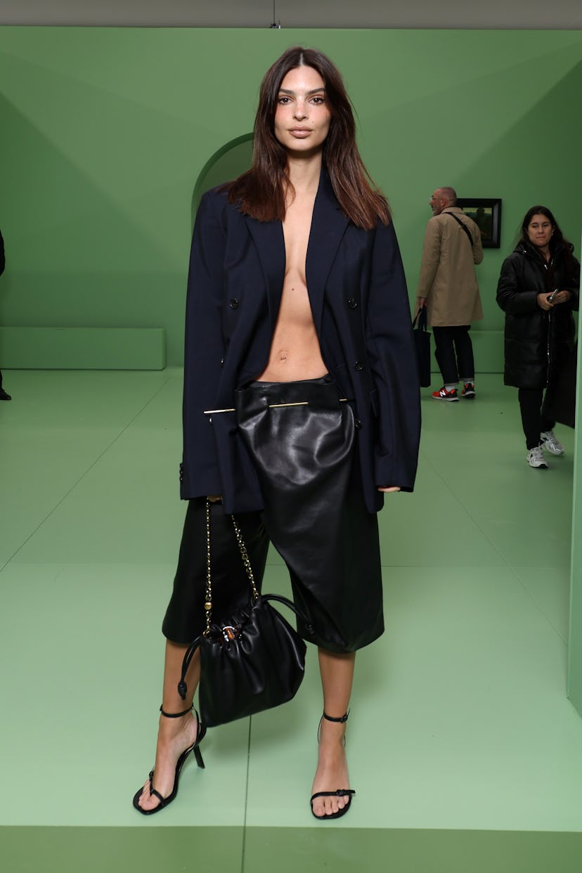 Emily Ratajkowski wears a blazer and shorts to attend the Loewe Womenswear Fall/Winter 2024-2025 sho...