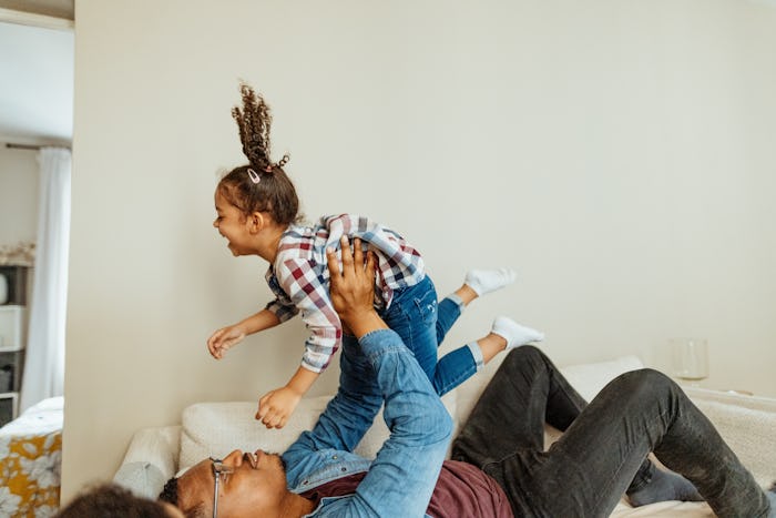 Multiracial family enjoying moments at home