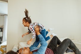 Multiracial family enjoying moments at home