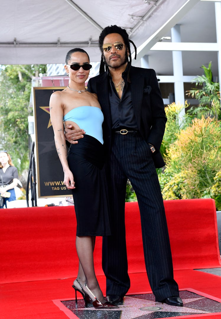 US musician Lenny Kravitz poses with his daughter actress Zoe Kravitz on his newly unveiled star dur...