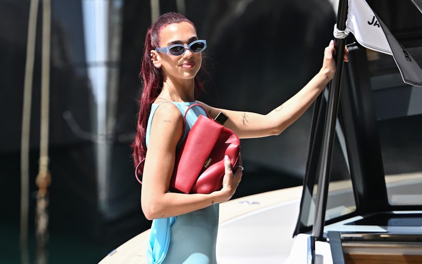 CAPRI, ITALY - JUNE 10: Dua Lipa attends the Jacquemus "La Casa" Cruise at Casa Malaparte on June 10...