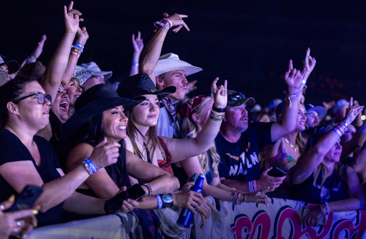 Fans watch Hardy perform on the Mane Stage on the final day of Stagecoach Country Music Festival.