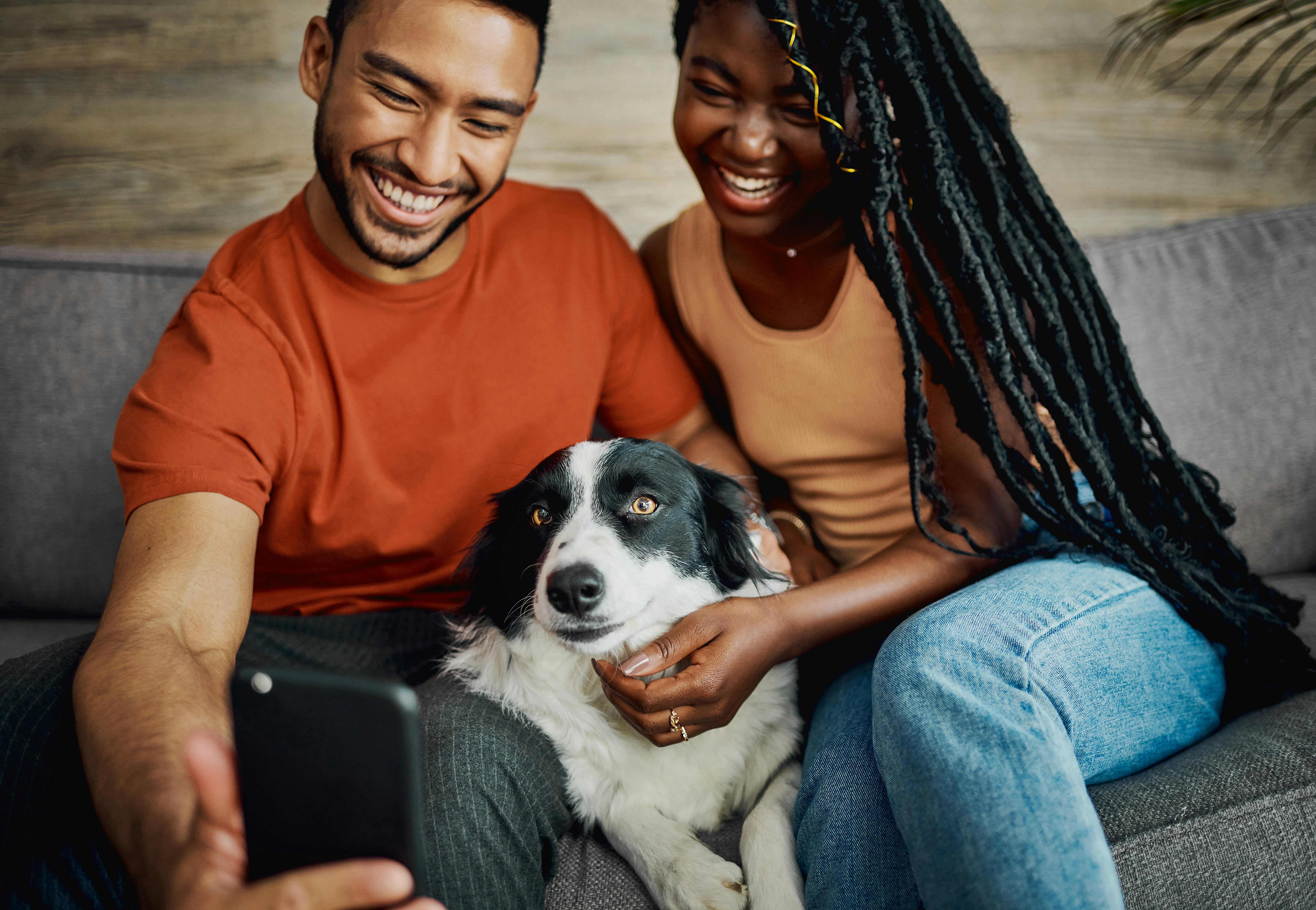 A woman gives her boyfriend an anima-related nickname as they take a selfie with their dog on the co&hellip;